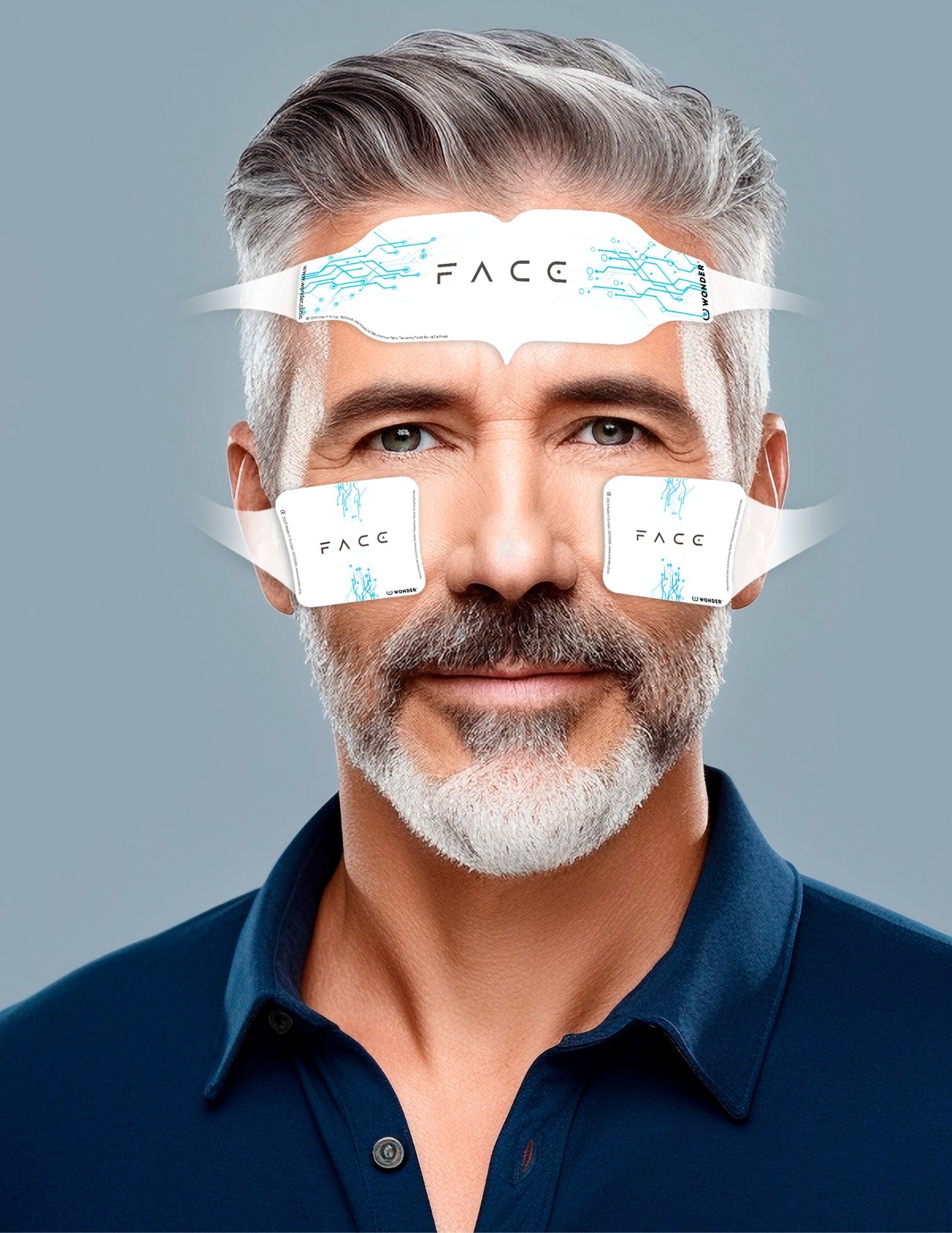 Man using WonderFace, the facial toning device